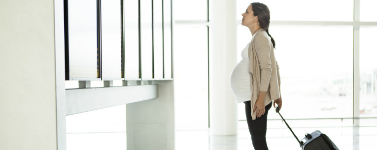 Allianz - pregnant lady with suitcase