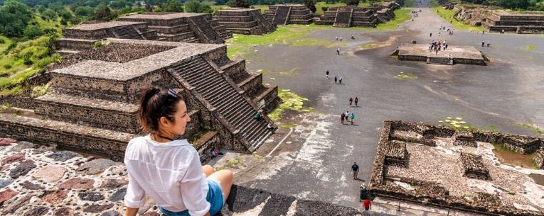 Allianz - young female visits ancient Teotihuacan pyramids in Mexico City