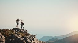 hikers at the top of a mountain