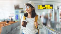 woman with passport in airport